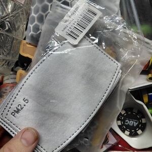 pack of RainCaper brand PM2.5 five-layer activated carbon filter inserts X7